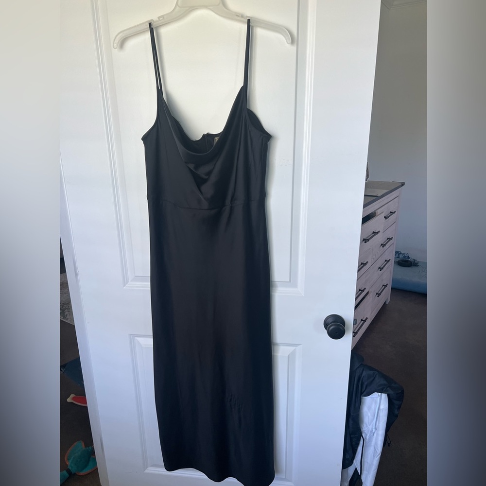 Black scoop neck satin dress.